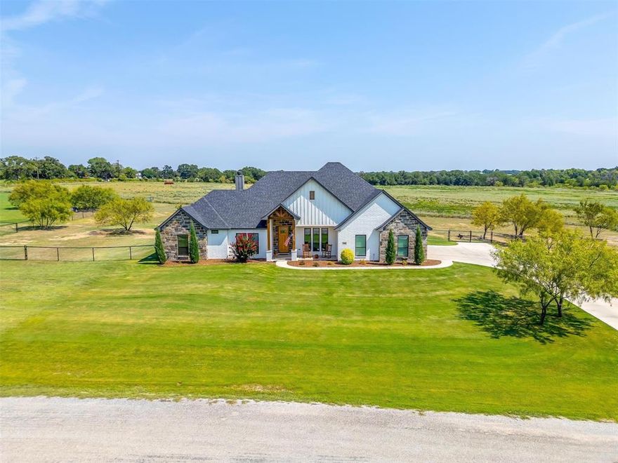 PICTURE PERFECT property in Brock ISD! It has the curb appeal that everyone pins on Pinterest! Gorgeous stone, brick and board & batten combination with a cedar beam entrance. Fully fenced with plenty of space in between the neighbors, as these first 4 lots are the widest in the community. Wide open views in the back are peaceful and stunning! As you walk in the front door and pass the office with glass French doors, you'll find a great living room with cedar cathedral ceilings, wood-burning stone fireplace and white oak hand-scraped hardwood floors. Gorgeous open concept with a two toned kitchen with island, cozy dining room, farmhouse lighting and so much natural light! Patio has bathroom access for future pool designated pool bath. Split floorplan, show stopping primary bath with massive walk-in shower and a laundry room DREAM with sink and additional storage & counterspace! Only 4-5 minutes to all the schools. This place has it ALL! Schedule a private showing today!
