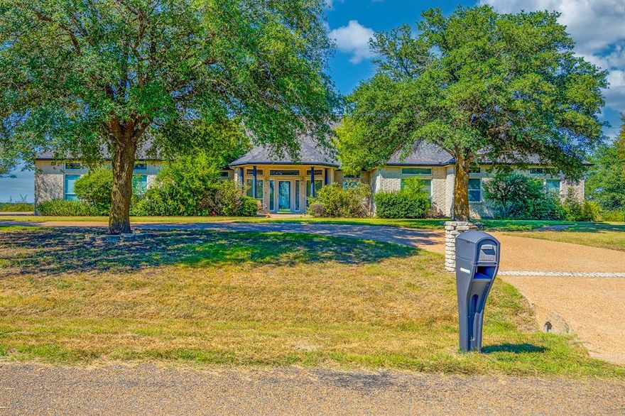 Welcome to 120 Chambers Dr. — where outdoor living meets family comfort on over 1 acre in charming Italy, Texas. This 4-bedroom, 3-bath home offers the perfect blend of space, fun, and everyday comfort—ideal for making memories year-round.
Step outside to your own backyard retreat featuring a sparkling pool, sand volleyball court, and a wide-open yard shaded by mature trees—plenty of room for gatherings, play, pets, or simply enjoying quiet evenings on the deck. Inside, you’ll love the split-bedroom layout and a large game room perfect for movie nights, entertaining, or a home gym.
The private primary suite is a true escape, complete with a see-through fireplace that warms both the bedroom and the spa-style en suite bath with a jetted tub, separate shower, and a spacious walk-in closet.
And here’s the best part: this is a wonderful opportunity for your family to personalize the paint and truly make the space your own while enjoying the freedom and privacy that comes with acreage living. Just minutes from highway access for an easy commute—yet tucked away on a quiet, picturesque street—this home feels like a getaway every day.