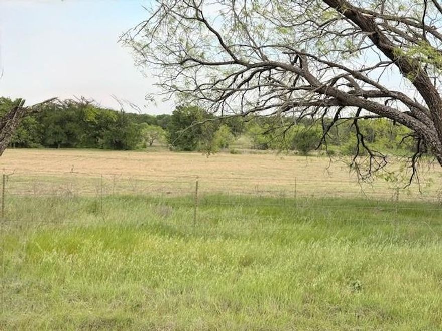 Looking to relocate out of the city? This 20 acres has lots of potential, the diverse landscape features two stock tanks, combination of open fields and wooded areas ensuring privacy and flexibility for building a home, small ranchette, or simply enjoying a getaway. 
Easy access to US Hwy 180 and I20. Just 45 minutes West of Ft Worth.