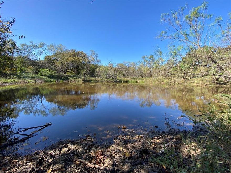 Beautiful 11.747 acre tract located in the heart of Comanche County, within the highly regarded De Leon School District. This property offers a fantastic opportunity for nature lovers and those seeking a peaceful retreat.
A water meter is available through Comanche WSC, and electricity can be accessed via Comanche Electric Cooperative Association (CECA).
Restrictions are implemented to safeguard your investment while allowing for flexibility in your future plans.
The land features abundant wildlife cover, making it ideal for outdoor enthusiasts. A sizable tank and Sipe Springs Creek enhance the natural landscape and attract local wildlife. The property is wildlife exempt. Per the seller, there is an old well on the property but they never did anything with it. 
The property is adorned with magnificent oak trees, mesquite, and shinnery. During my visit for pictures, a deer was spotted within a few yards away from me, highlighting the area's wildlife activity. This exceptional property is a rare find. Whether you're looking to build your dream home or create a weekend getaway, this piece of land has it all.