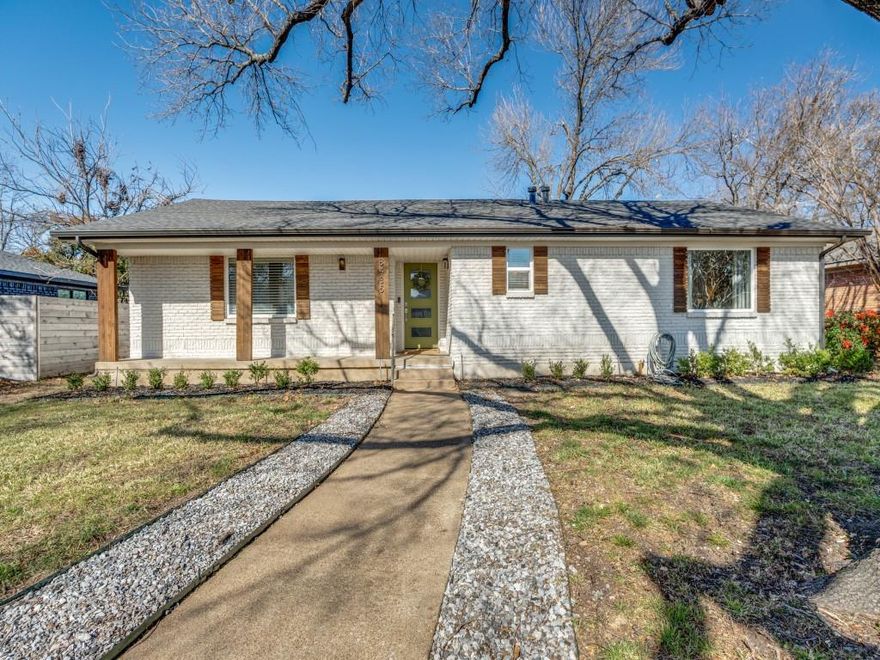 Tastefully renovated East Dallas cottage with close proximity to White Rock Lake.  This inviting open floor plan offers two spacious living areas adjacent to a fully updated  2021 kitchen with elegant quartz counters, stainless appliances including a gas range, refrigerator freezer, dishwasher and built-in microwave.  A convenient laundry room houses a stackable washer & dryer which will convey with the sale of the property.  Richly refinished natural hardwoods in all living areas and bedrooms providing consistent flooring and attractive visual flow throughout.  The primary offers two closets along wtih an en-suite bath complete with a generous bathing tub and shower combo.  The secondary bedrooms share a bathroom with spacious shower.  This lovely home has newer (2021) double pane windows throughout providing abundant light as well as improved efficiency, in addition to a 2021 composition roof and gutters.  An attached two car garage and spacious covered patio overlooking a large play yard complete this family friendly, move-in ready home!