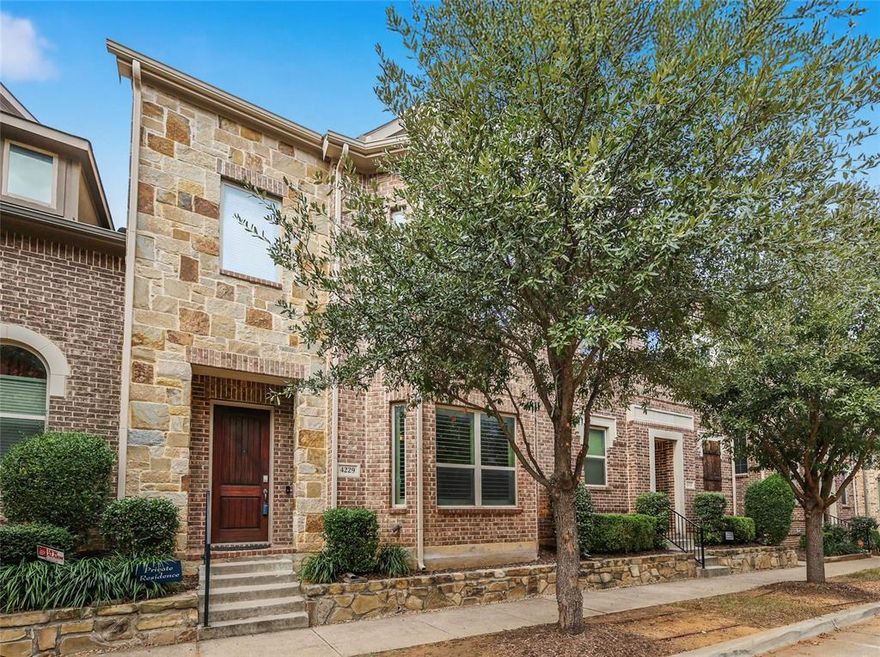 Walk to restaurants and community events in this 3 bedroom, 2.5 bath townhome in the heart of the Flower Mound Riverwalk community! Hand-scraped hardwood floors greet you upon entry to the large family room with custom plantation shutters. Quartz countertops, stainless appliances and a walk-in pantry make the kitchen a chef's delight. Enjoy your morning coffee from your quaint private courtyard. The second story boasts a large owner's suite and primary bathroom with dual sinks, a large, custom walk-in shower and walk-in closet. As you continue down the upstairs hallway, you will find a utility room, two additional bedrooms and an additional full bath. The home provides a two-car garage and ample storage. Don't miss this amazing home in the heart of the Flower Mound community close to great shopping, dining, and Flower Mound schools.