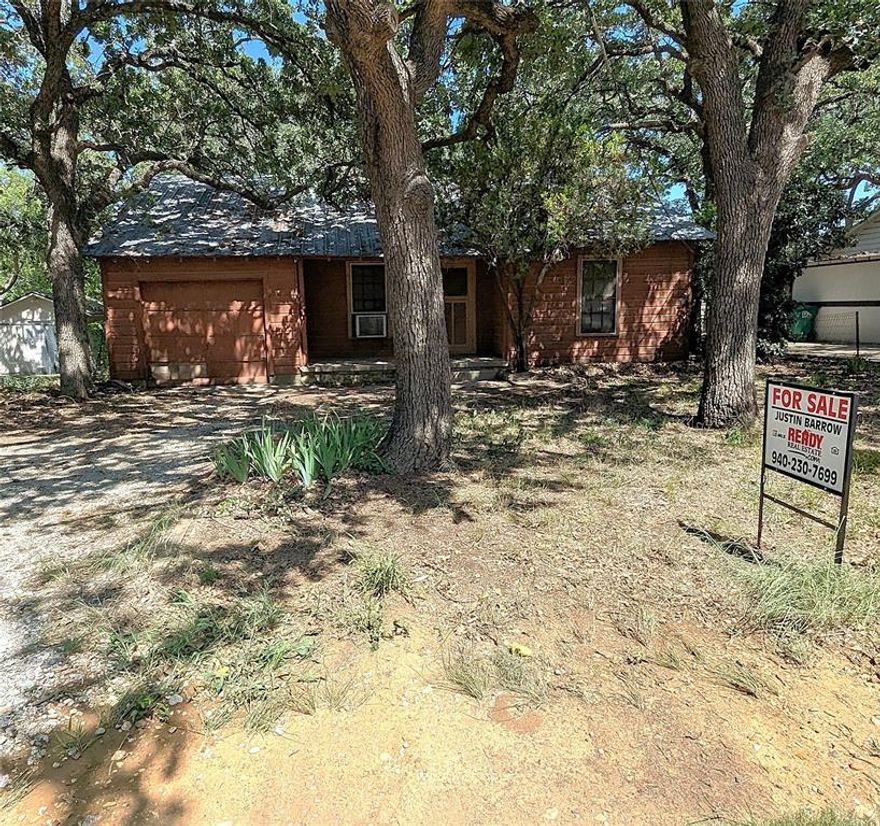 This property offers a fantastic opportunity for those seeking a project to customize and create their dream home!

This charming home exudes curb appeal and offers the perfect blend of location and convenience, especially for those seeking proximity to the University of North Texas (UNT). With its welcoming vibes and prime location, this property is ideal for students, faculty, or anyone looking to embrace the vibrant Denton lifestyle. You'll find yourself just a short distance from the UNT campus, putting you at the heart of academic and cultural activity. The home features 3 bedrooms and 1 bathroom. It features a large backyard, massive shed, covered front porch, mature trees, making it a private sanctuary for outdoor enjoyment and entertaining. Beyond the charm of the home itself, its location is a true highlight. Walk or bike to UNT and explore the lively Fry Street district, full of eateries and entertainment options. Take advantage of Denton's unique cultural scene, from live music venues to the historic Courthouse-on-the-Square. The neighborhood itself boasts a friendly atmosphere, with many enjoying the walkability and dog-friendly spaces, according to Nextdoor. The Denton Community Market, located just off the Square, is within walking distance of campus and offers fresh produce, live music, and local art, notes the University of North Texas.