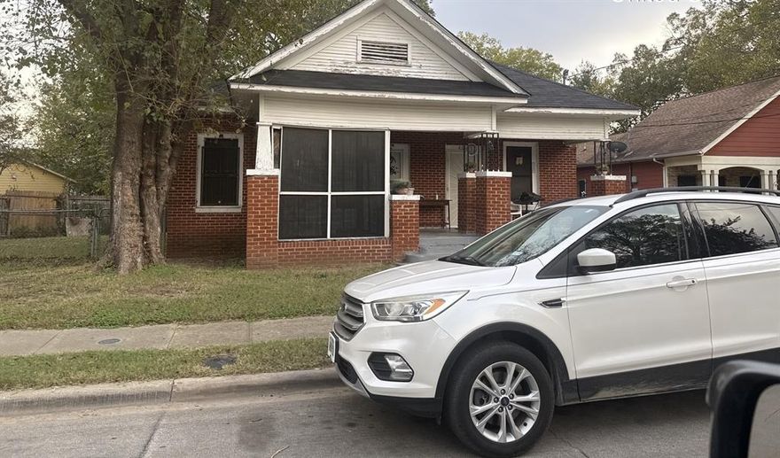 Fantastic investment opportunity! This spacious 4-bedroom, 2-bath home features charming built-ins, ceiling fans throughout, and classic wood paneling. A great canvas for your personal touch!