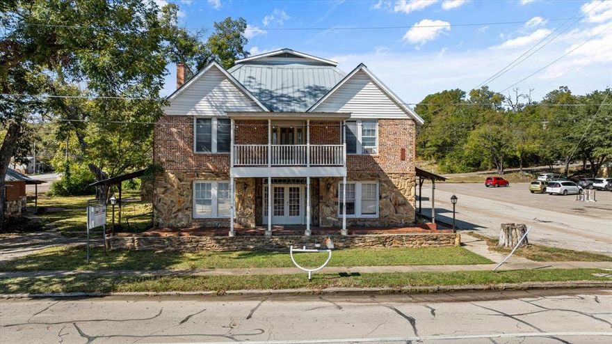 Barnard Street Cottages and Hotel building is ready for your vision and dreams.   This unique property is ready to come back to life and can be used for boutique hotel, cottages, bed and breakfast and so much more.   This property is one block from the Historic Glen Rose square and encompasses almost a full city block with additional lot across the street.  The main building was built in early 1900 around 1912 and once operated as the Lane Hotel.  Main building is 3 story, with 2 of them used as guest rooms and the main building could have up to 14 guest rooms,  the 3rd floor is currently being used as storage, but is decked and has some stud walls and could be a shop area, storage or whatever your imagination brings, also on the grounds in 3 cottages,  1 is a 2 bedroom cottage, other 2 cottages are single bedroom and bath with a coffee bar area.   The 3 cottages have been recently updated and are more readily available to be ready for use.   The hotel will need to be renovated or remodeled,  but has various stages of renovations.  Glen Rose is a booming area, with shops, festivals and lots of opportunities to build this into a destination hotel and cottages.  River is just down the street,  Fossil Rim, Dinosaur valley state park, concerts, music, golf courses within a few miles, and events.   Just over an hour from DFW and near Historic Granbury, Stephenville and Cleburne this makes this hotel and cottages a great opportunity to invest and redo for your own ideas and vision.   Grounds have trees, old well and so much to offer within walking distance to the square, places to eat, visit and listen to music.