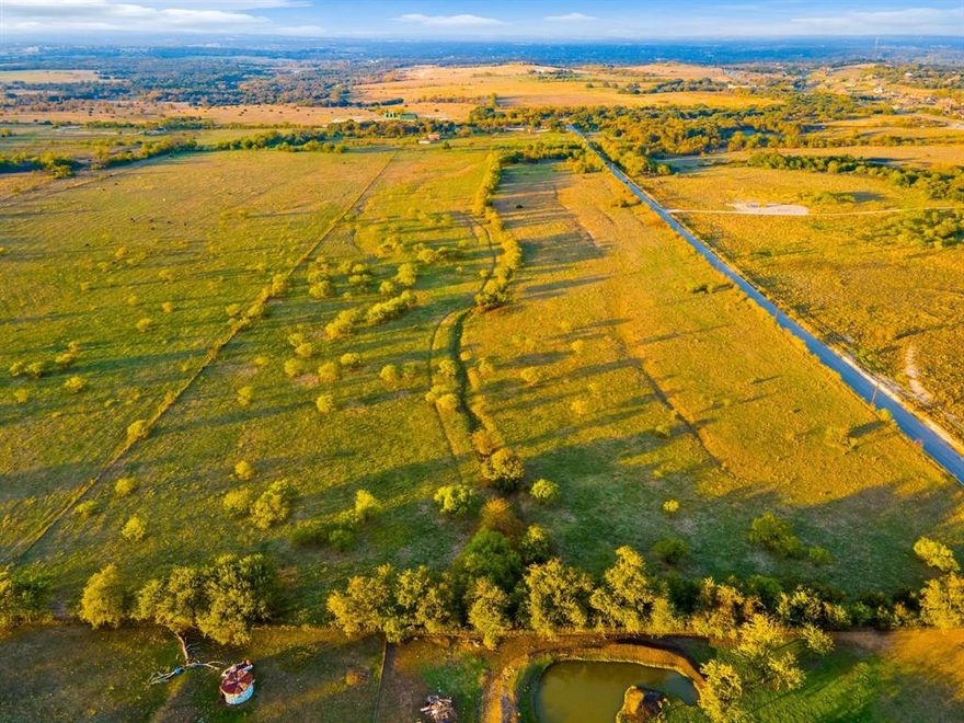 Approximately 10 miles west of Fort Worth on I-20 and approximately 4.5 miles south of I-20 on FM 5, 132 usable acres, prime for residential development in the highly sought-after Aledo school district. Gently sloping topography yields big panoramic views from Benbrook to Hudson Oaks!  Adjacent to the popular Bear Creek drainage. 2045 feet frontage on Muir Road and 2765 feet frontage on Savage Lane. In close proximity to the newly proposed 2,400 acre Kelly Ranch residential and golf community. Easy commute to Fort Worth, Weatherford and Granbury. Livestock on property. Shown by appointment only.  Serious inquiries only!