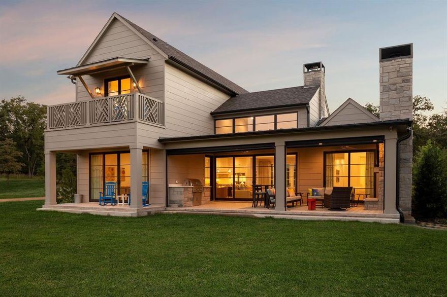 OFFERED FULLY FURNISHED

Thoughtfully designed for effortless lake living, this beautifully appointed residence offers a refined retreat within the coveted community of Long Cove. Tucked into the peaceful Eastport neighborhood, the home enjoys a serene setting beside a picturesque fishing pond, while an open-water boat dock and miles of scenic trails are just a short walk away—providing the perfect balance of privacy, tranquility, and easy access to the lake.

The home was designed with gathering in mind. Two primary suites on the main level provide comfort and convenience, while two spacious bunk rooms create an inviting space for hosting family and friends. Inside, designer finishes add warmth and sophistication throughout, creating interiors that feel both elevated and welcoming.

At the heart of the home, light-filled living spaces flow seamlessly to an oversized covered porch overlooking the pond—an idyllic backdrop for morning coffee, sunset dinners, and relaxed weekends at the lake. A built-in grill and retractable screens extend the outdoor living space, allowing for effortless entertaining and year-round enjoyment.

Offered fully furnished (with artwork excluded), the residence is truly turnkey—simply arrive and begin enjoying the Long Cove lifestyle. Located just steps from the upcoming Meadow Club, owners enjoy convenient access to the community’s celebrated amenities, including miles of scenic trails, golf, pickleball and tennis courts, resort-style pools, waterfront dining, and endless opportunities for recreation and connection.

Peaceful, beautifully designed, and ideally positioned, this home captures the essence of elevated lake living—where every detail is designed for comfort, gathering, and effortless enjoyment.