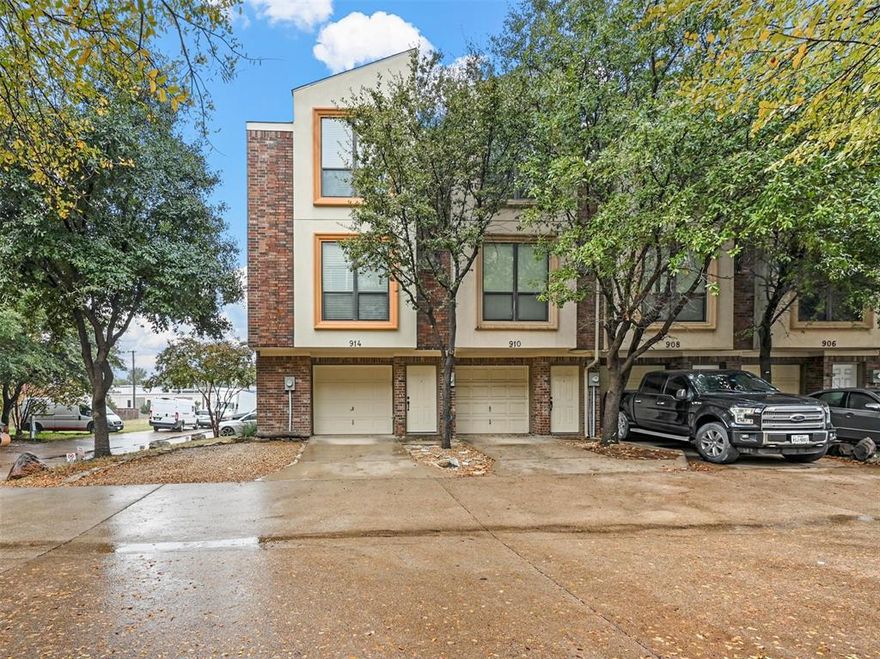 Beautiful townhome across the street from University of Texas at Arlington (UTA); great location! End unit with lots of windows and natural light. Side yard is included with the property. Appliances include: Refrigerator, Stove, Microwave, Dishwasher, Washer & Dryer. Extra parking spot next to driveway. Ground floor is a one car garage with washer & dryer. Second floor is kitchen, dining, living and half bath. Third floor has 2 bedrooms, each with a full bath. Largest unit in the complex; schedule a showing today!
