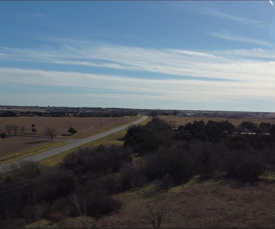 BUILD OR INVEST on this Great Location just minutes from I45 in Ennis. Up to 50 acres available. Call Agent for details please.
Aerial DRONE VIDEO AVAILABLE.