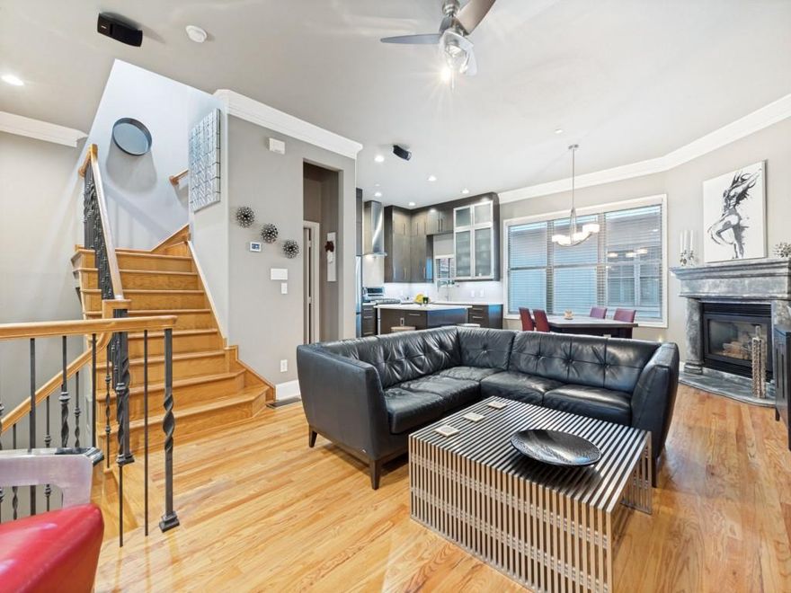 The Gem of Georgetown Courts Townhomes! This Magnificently Updated timeless Brownstone is Gated and Lock and Leave! Quality Enhanced Updates throughout this property. Onetime owners who have renovated this 3-2-2 into a designer's masterpiece. This move-in ready home features new hardwood floors, crown molding, and tall ceilings that create a warm, polished atmosphere filled with an abundance of natural light. The Modern kitchen offers quartz counters, stainless steel appliances, a gas range, and bar seating that flows into an open living and dining area with fireplace which is perfect for hosting friends or relaxing at home. Also, a renovated Powder bath off the kitchen. Surround sound enhances the experience, whether you're entertaining guests or enjoying a quiet night. Upstairs the spacious primary suite includes a custom walk-in closet, renovated primary bathroom with dual sinks, claw bathtub, and separate shower. Also, a wonderful Rooftop deck is off the Primary. The renovated utility room with stacked washer and dryer and sink and many built-in cabinets. Also located on the second level are two large bedrooms with large walk in closets and a wonderfully renovated shared bathroom. The charming and tranquil den on the second floor is such a great place to chill.  This is one of the few properties in Georgetown Court Townhomes with 3 bedrooms. HOA covers water, landscaping, insurance, and the roof was replaced in 2020. This home is near the beautiful Exall Park, Baylor Medical Center, and just minutes from Uptown, Downtown, Knox Henderson, Deep Ellum, Klyde Warren Park, and the Dallas Arts District. Many more amenities.