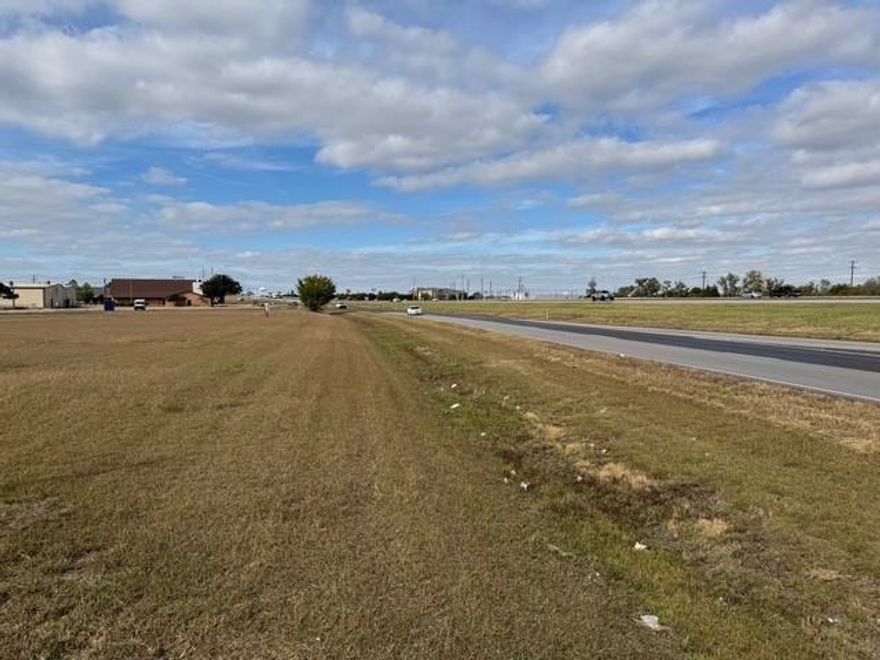 Prime commercial lot located in a highly visible, high-traffic area, directly accessible from the highway. This centrally located parcel offers tremendous potential for retail development, with excellent exposure to both local and passing traffic. The lot is fully cleared and ready for immediate construction, and essential utilities including water, sewer, and electricity are available. Perfect for businesses looking to capitalize on a thriving, well-traveled location.
