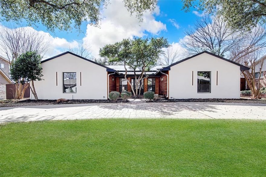 This striking modern home, set on a beautifully landscaped lot with matures trees, a circular driveway, and a lush green lawn, offers a serene contemporary aesthetic in the highly sought after Spring Creek area with award winning Richardson ISD schools.  Completely remodeled with modern lighting and cedar plank entrance, this 4 bedroom welcomes you into a stunning foyer and vaulted ceilings in the living area with recessed lighting throughout the house creating a bright and open atmosphere. The main living area features a cozy gas fireplace and a stylish dry bar perfect for entertaining and built in cabinets.  The updated kitchen is a true standout, showcasing a stunning backsplash, quartz countertops, a gas range, all designed with both functionality and style in mind. The dining area is highlighted by a gorgeous chandelier and flows seamlessly into a second living space with a large window that fills the home with natural light.  The spacious primary suite offers a relaxing retreat with recessed lighting, a ceiling fan, and a private ensuite bathroom featuring a walk-in shower. Bedrooms 2-3 share a jack and Jill bathroom with dual vanities, a tub-shower combo and decorative lighting.  Step outside to your private backyard oasis, where the charming brick pathway leads to a beautiful sparkling pool, complemented by great yard space perfect for entertaining, children or pets. This home is also equipped with fully paid off solar panels, providing exceptional energy efficiency with average electric bill ranging from just $18.00-$25.00 per month.  All information provided is deemed reliable but not guaranteed. Buyers and their agents are responsible for verifying all details including square footage and school information.