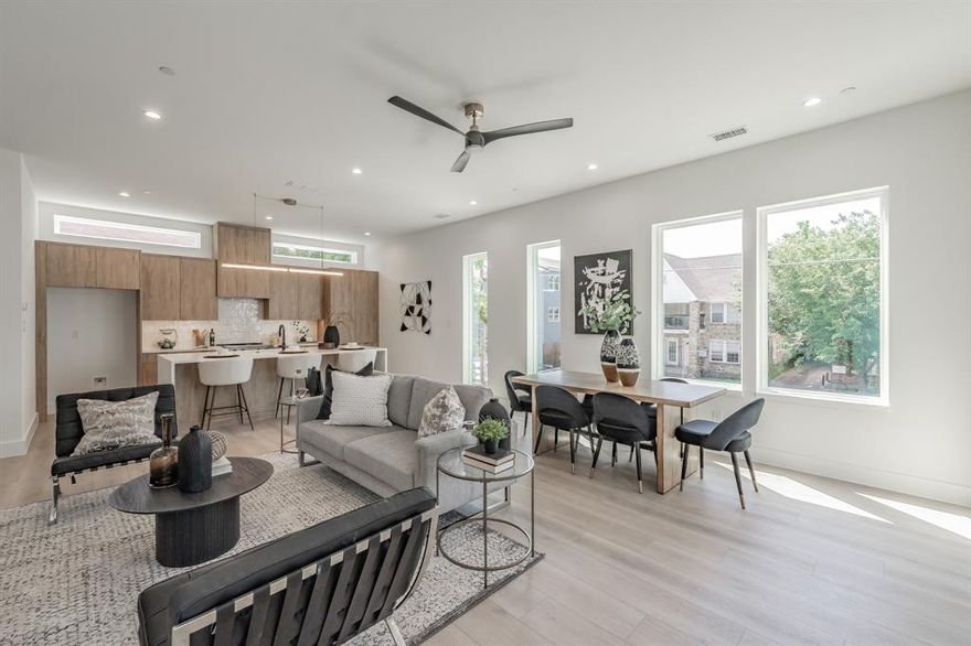 Experience modern luxury in this newly constructed East Dallas condo offering 2 bedrooms, 2.5 baths, and 1,442 square feet of thoughtfully designed living space. The open-concept layout features an eat-in kitchen with waterfall countertops, stainless steel appliances, luxury vinyl plank flooring, and abundant natural light throughout. Both upstairs bedrooms include en suite baths, complemented by a convenient upstairs laundry and an attached two-car garage. Ideally located near Lower Greenville and just minutes from Lakewood, Knox-Henderson, and downtown, this stylish residence delivers exceptional functionality in a prime location. Photos are of model unit.