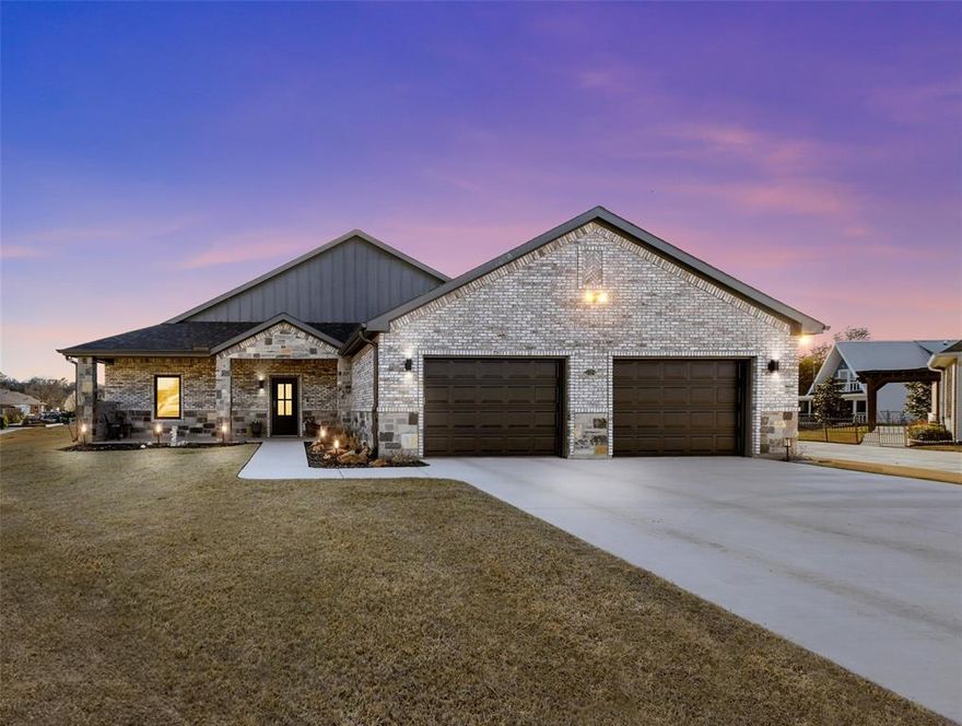 Stunning Custom Waterfront Home in Runaway Bay – Perfect for Personal Retreat or Airbnb Investment!  This sprawling, open-concept waterfront home is designed for comfort, functionality, and breathtaking water views. With a split-bedroom layout, the expansive living and kitchen area is light and bright, seamlessly blending indoor and outdoor living. The gourmet kitchen features quartz countertops, an oversized breakfast bar, and abundant cabinetry — ideal for entertaining guests or hosting short-term rentals.  A massive utility and mudroom includes a butler’s pantry and extensive storage. The private primary suite offers a spa-like ensuite with a luxurious soaking tub, separate shower, and a dedicated dressing area just outside the oversized master closet. Step out onto your secluded patio escape or enjoy the spacious back outdoor living area.  Guest bedrooms are tucked on the opposite side of the home with a Jack-and-Jill bath, plus an additional powder room for visitors. The oversized two-car garage provides plenty of room for lake toys. Situated on a large lot with a concrete retaining wall and shared private boat ramp, this property is fully equipped for lake life.
 Offered fully furnished, this home is an incredible opportunity — whether you’re looking for your dream waterfront getaway or a turn-key investment for Airbnb or short-term rental income. Just bring your clothes and start enjoying the lifestyle!