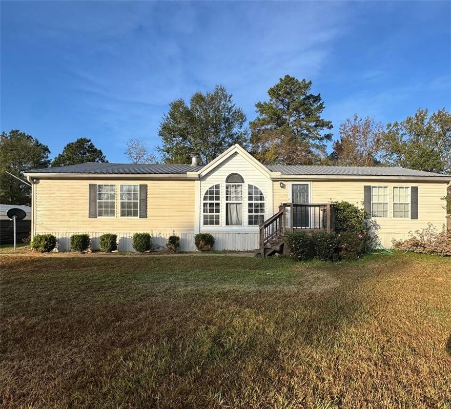 Don't let this one pass you by! Conveniently located to North Desoto Schools and only miles from I-49, right in the heart of Stonewall. This 3 bedroom, 2 bath home sits on over half an acre. The huge backyard provides plenty of space for kids to play and family gatherings. New hot water heater and all of the furnishings will remain with home if buyer would like! Refrigerator to remain as well. This peaceful little neighborhood awaits its new buyers!