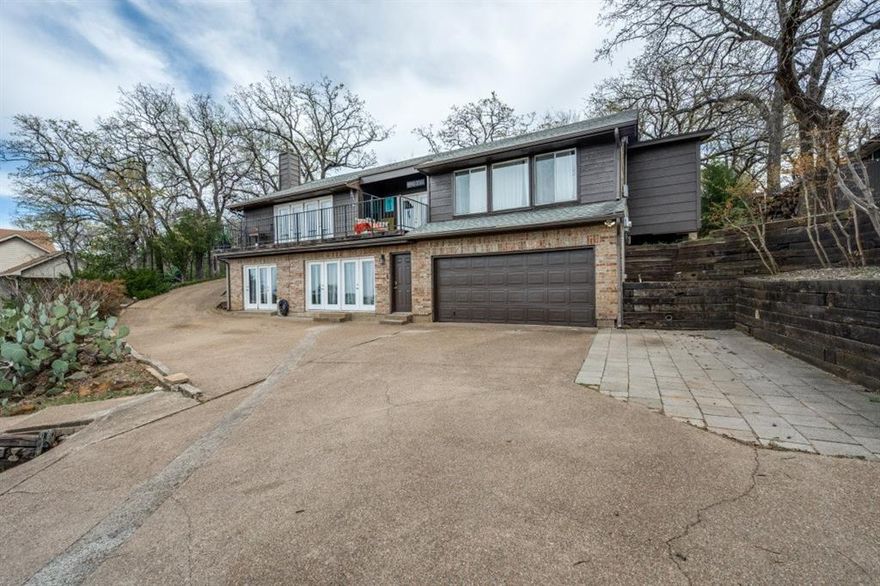 Hilltop Home with Panoramic Views, Golf Course Setting and Private Apartment

Perched at the top of a hill in Arlington, this unique property offers breathtaking panoramic views, including stunning sunsets and unforgettable firework displays right from your own home. Backing to a golf course, the setting provides a rare combination of privacy, scenery, and lifestyle.

The main level features a well-designed 2-bedroom, 2-bath layout upstairs, filled with natural light and positioned to take full advantage of the elevated views. The living areas create a warm and inviting space to relax or entertain while enjoying the beautiful surroundings.

Downstairs, you’ll find a separate 1-bedroom apartment, perfect for multi-generational living, guests, rental income, or a private home office setup. This flexible space adds incredible value and versatility that is hard to find.

Additional highlights include

Hilltop location with panoramic city and golf course views

Spectacular sunset and firework views

2 bed  2 bath main living area

Separate 1-bedroom apartment downstairs

Ideal for multi-generational living or income potential

Located in an established neighborhood with no HOA

This is a rare opportunity to own a view property in Arlington with built-in flexibility and income potential.

Homes with views like this rarely come available—schedule your showing today before it’s gone.