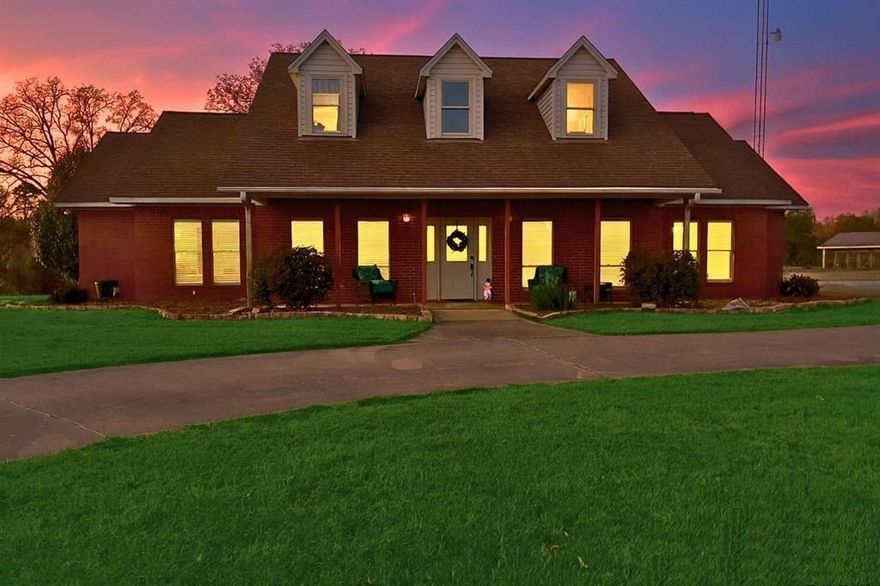 THIS IS SUCH A UNIQUE PROPERTY WITH SO MANY FIRST CLASS AMENENITIES . A PERFECT LOCATION FOR THIS MINI-RANCH WITH WATER FRONTAGE. YOU ARE JUST MINUTES AWAY FROM HISTORIC DOWNTOWN MINEOLA AND THE 2900 AC MINEOLA NATURE PRESERVE. THE HOME IS A CUSTOM BUILT BRICK THAT HAS BEEN RECENTLY RENOVATED WITH A KITCHEN THAT THE CHEF OF THE HOUSE WILL TRULY FIND EXCITING AND IS COMPLETE WITH AN ISLAND AND EATING AREA. THERE IS A FLEX ROOM OFF THE KITCHEN THAT COULD BE A SMALL DEN,STUDY, OFFICE OR HOBBY AREA. SPACIOUS LIVING AND DINING COMBO THAT WILL ACCOMMODATE A LARGE SECTIONAL AND DINING TABLE-NOTE THE UNIQUE DINING LIGHT FIXTURE. THE FREESTANDING ELECTRIC FIREPLACE WILL REMAIN WITH THE PROPERTY. PRIMARY BEDROOM IS OVERSIZED AND OFFERS A LARGE SITING AREA. THE EN SUITE BATH INCLUDES A FREESTANDING MODERN TUB AND SEPARATE SHOWER, SEPARATE LAVATORIES AND A LARGE WALK INCLOSET. DOWNSTAIRS HAS A HALF BATH FOR THE CONVENIENCE OF YOUR GUESTS. THE OTHER TWO BEDROOMS   ARE UPSTAIRS WITH A BATH TO ACCOMMODATE THAT AREA. YOU OWN THE MAJORITY OF THE EAST SHORELINE OF THE PRIVATE LAKE COMPLETE WITH A FISHING PIER. COVERED RV STRUCTURE ON SLAB WITH ELECTRIC HOOK UP, TWO ENCLOSED BUILDINGS ON SLAB AND A 3 SECTION LARGE EQUIPMENT SHED. PRIVATE WELL FOR YARD AND GARDEN. YOU HAVE A SEPARATE BUILDING WITH TWO AREAS WITH ELECTRICITY THAT YOU COULD MAKE INTO GUEST QUATERS OR USE AS A HOBBY OR OFFICE AREA. ATTAHCED TO THIS BUILDING ARE 12 KENNEL STALLS, EACH WITH AN OUTSIDE AREA FOR YOUR ANIMALS. CONTROLLED ACCESSTO PROPERTY BY SECURITY GATE. DEED RESTRICITED TO NO MOBILE OR MOVE ON HOMES, ONLY SITE BUILTHOMES AND NO COMMERCIAL BUSINESS.SEE ATTACHED AMENITY LIST THIS IS TRULY YOUR OPPORTUNITY TO OWN YOUR MINI RANCH WITH WATER FRONTAGE,10 ACRES AND THE PERFECT LOCATION. THIS PROPERTY HAS IT ALL--DON'T MISS YOUR CHANCE TO OWN A LITTLE PIECE OF EAST TEXAS HEAVEN!