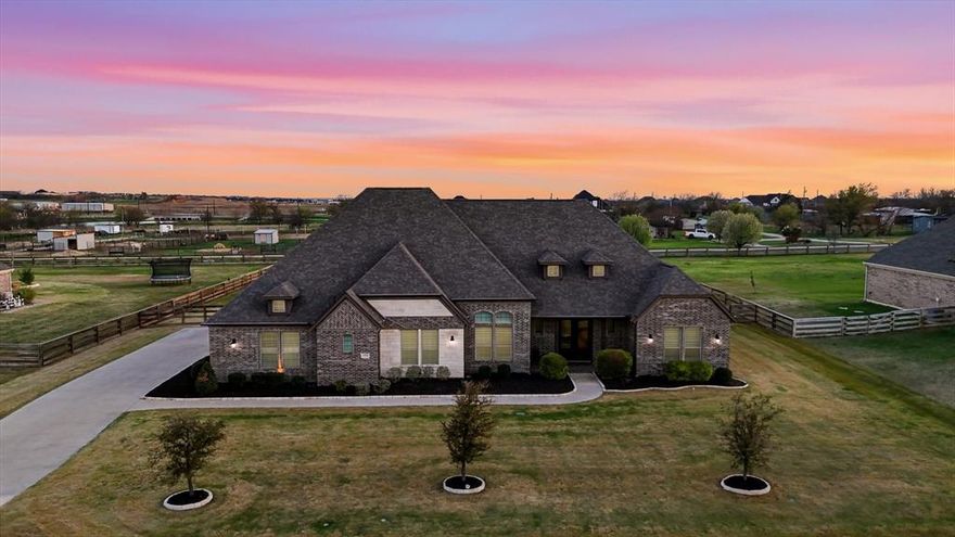 Beautiful custom true one-story home, on a full acre in the sought-after Prairie View Farms community, located within award-winning Argyle ISD! This thoughtfully designed home offers 5 bedrooms, 4 full bathrooms and a spacious layout including media and game rooms for entertainment and everyday living. The open-concept living area showcases a floor to stone ceiling stone fireplace, upgraded finish-outs, custom built-ins and inviting living spaces that seamlessly connect the kitchen, featuring a huge kitchen island, dining and family room. A neutral palette and abundant natural light that fills the home, creates a warm and inviting space for gathering. Step outside to a large private backyard retreat featuring an extra large patio and outdoor kitchen with a sparkling pool and spa, perfect for enjoying the Texas lifestyle and entertaining year-round. The upgrades continue into the garage with an electric car outlet, an extra 7 feet added to extend the garage and an extra lane in the driveway to accommodate more vehicles. Combining quality craftsmanship, thoughtful design and exceptional indoor-outdoor living this property provides comfort, space and a prime location in one of Argyle's most desirable communities!