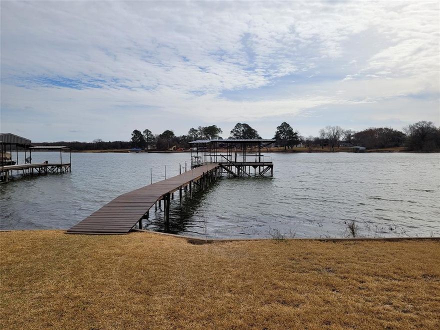 A great opportunity to live in water front.  This house comes with a private boat dock with boat lift, bright LED lights, fish cleaning table,  and a gorgeous 0.6Acre backyard with lake view. With the shadow from fruit and flower trees, it is perfect to walk your dogs and play with your kids and friends and big family members in a sunny afternoon. There is also a vegetable garden and a sun house if you want to plant your own vegetables. The entire lawn is irrigated by free lake water.  The house comes with 3 bedrooms, 2 full baths, 2 dining areas. HVAC Upgrades include an energy efficient outdoor unit in 2019, inside air handler in 2023, and a high efficiency 2-zone mini split heat pump in 2024, for extra cooling and heating. One of the two enclosed garages is included with the price. Please discuss the second garage and carport if they are a must need for you. 
All information is approximate, tenants to verify. disclosure: owner is a licensed realtor in Texas.
if interested, please send me your application on zillow before schedule a show.