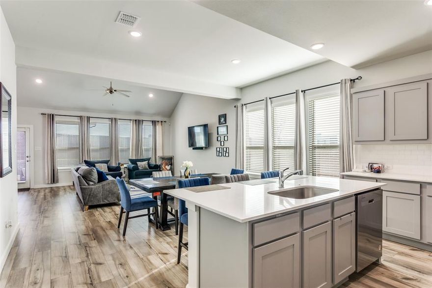 Welcome to this almost new construction home in the sought-after Chisholm Trail Ranch community in Crowley. Situated on an oversized lot with no home next door, this property offers added privacy and a rare sense of space.

The thoughtfully designed floor plan features vinyl wood flooring throughout the downstairs, granite countertops, and an open living area perfect for everyday living and entertaining. With two bedrooms and full bathrooms on the main level, this layout is ideal for guests or multi-generational living.

Upstairs, enjoy a spacious game room loft along with additional living space. The home also includes a large laundry room, ample storage, and a walk-in attic for added convenience.

Step outside to a covered patio overlooking the oversized backyard—perfect for relaxing or entertaining.

Energy-efficient features, including a tankless water heater, provide comfort and cost savings.

The washer & dryer and the refrigerator will be left with the home.

Move-in ready and offering the benefits of newer construction without the wait, this home is a must-see! Ideally located near shopping, dining, and major highways for an easy commute, this property combines modern finishes, functional design, and everyday convenience. Don’t miss this opportunity to own a well-maintained home in a growing area with strong long-term value.