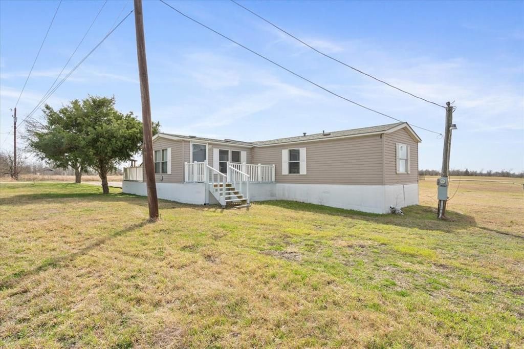 Photo of 216 Moore Street, Rogers, TX 76569 (MLS # 21194243)