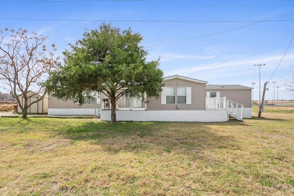 Photo of 216 Moore Street, Rogers, TX 76569 (MLS # 21194243)