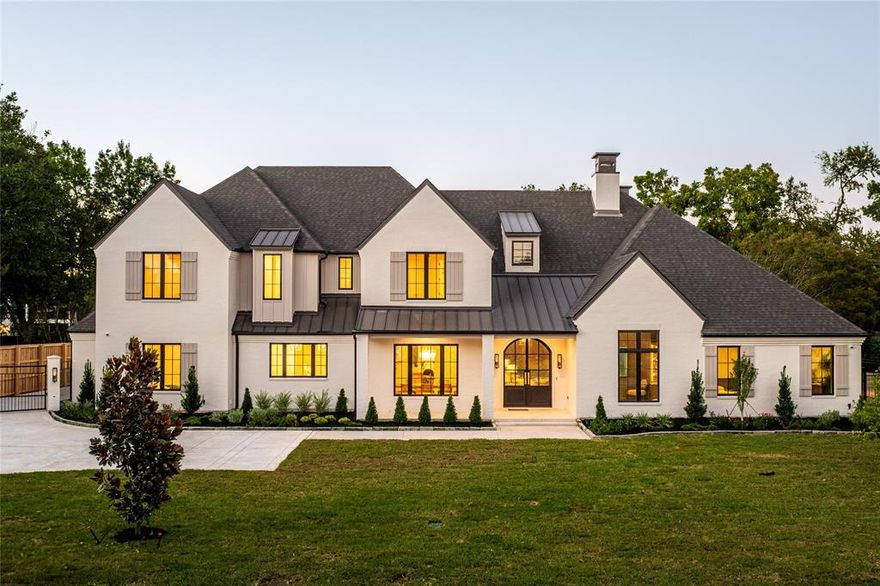 Elegantly nestled on one of the most distinguished streets in Dallas' coveted private school corridor, this picturesque 5-bedroom white brick traditional new construction home stuns with impressive curb appeal and timeless charm. Inside, a forward-thinking floor plan offers spacious, light-filled living with thoughtful amenities throughout. High-quality craftsmanship is paired with trending designer finishes, creating a seamless blend of classic elegance and modern comfort. A private office on the main floor features pocket doors that open to a hidden speakeasy-style retreat-- a perfect man cave or golf simulator space thanks to its soaring ceilings. Upstairs, a spacious loft offers an ideal kid's hangout or media area, accompanied by a separate flex room originally envisioned to hold eight custom bunk beds. Whether transformed into a gym, playroom, or creative studio, the space adapts effortlessly to your needs.

Every detail has been thoughtfully curated, from the hidden grocery pass through from the garage to the concealed appliances within the prep kitchen and walk-in pantry. The oversized downstairs laundry room doubles as a craft space complete with custom wrapping storage, concealed hang drying space and a central island designed for both creativity or homework time. Whole home water filtration system, an electric rolling gate from alley entrance as well as a custom wrought iron gated front entry. Covered patio complete with built in kitchen, outdoor fireplace and remote controlled mosquito screens turn the space in to the ultimate outdoor to indoor living space and an entertainer's dream. This home is a statement of refined living--where timeless elegance meets contemporary comfort. A rare opportunity in one of the city’s most sought-after neighborhoods.