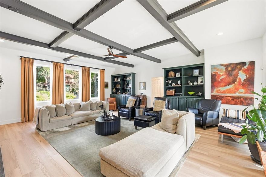 Absolutely stunning, completely remodeled and thoughtfully updated one-story home tucked away the the sought after Bent Tree Fairways, offers the perfect blend of modern luxury and timeless comfort. With four spacious bedrooms and two and a half beautifully designed bathrooms, the layout is ideal for both family living and entertaining. The heart of the home is an incredible kitchen featuring premium finishes, high-end appliances, custom white out center island with waterfall quartz edge, plenty of cabinets, quartz counters and terrazzo tile backsplash, 5 burner gas cooktop with exhaust and pot filler, a layout that caters to ultimate culinary creativity. The expansive living area is filled with natural light from floor to ceiling windows, amazing iron and glass doors, amazing wet bar with wine fridge and passthrough window, and anchored by a lovely doubled-sided fireplace with beautiful floor to ceiling tile on one side and warm fluted wood paneling on the other side. The den with wood paneling is the perfect spot to enjoy reading, entertaining or intimate family gatherings. The primary suite is a true retreat, boasting a spa-like bathroom with elegant fixtures, stand alone soaking tub, huge shower with multiple heads, windows with electric shades overlooking the stunning landscape and pool. Two secondary bedrooms attached by a jack and jill bath with custom white oak cabinets, quartz counters and updated tiled shower for your guests and kids. The fourth bedroom is currently being used as a home office with wonderful light and access to the pool. Recent upgrades include flooring, paint, roof, gutters, all windows, doors, and heating and air units, ensuring peace of mind and energy efficiency. Step outside to your private backyard oasis, complete with sparkling pool, relaxing spa and lovely covered patio and lighting. Turfed side yard works great for a dog run. This home is a rare gem, combining thoughtful design, quality craftmanship, and resort-style amenities.