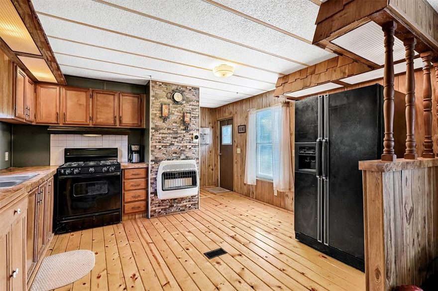 Charming Lake Retreat at Lake Texoma. Welcome to your perfect weekend getaway or full-time lake home! This well-maintained 2-bedroom, 2-bathroom property is nestled in the friendly VFW community on Lake Texoma, offering a relaxed lifestyle just steps away from the water. Enjoy the comfort of a cozy interior, ideal for simple living or entertaining friends after a day on the lake. The open living space flows into a functional kitchen and dining area, while both bedrooms offer privacy and convenience with two full baths. Step outside and find two storage sheds for all your lake gear, tools, or hobby equipment. The dedicated driveway and additional parking space makes room for guests, boats, or trailers—perfect for those who love to entertain or explore the lake. Located in a sought-after area with access to VFW amenities and the tranquil beauty of Lake Texoma, this home is a rare find at an affordable price. Don’t miss the chance to own your slice of lake life in Pottsboro! Buyer must be eligible to be a member of the VFW. Land is not included in sale, it is leased through the VFW.