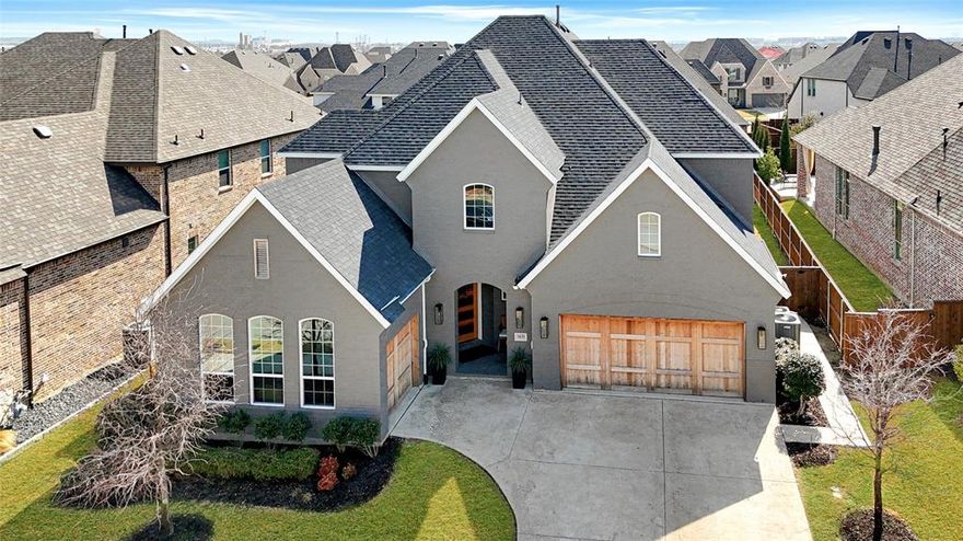 NO MUD, NO PID, NORTH FACING! No detail has been overlooked in this immaculately crafted 2-story in Star Trail with 2 bedrooms on the first floor! This sprawling plan built by American Legend Homes in 2021 offers 4 bedrooms, 4.5 baths, dedicated home office with French doors, first floor media room, huge upstairs loft with built-ins, and split 3-car garage! Additional bedroom on the first level with private bath is perfect for guests or in-laws! Upgrades and amenities include gorgeous hardwood flooring flowing throughout main living areas, ample storage space, designer paint tones, upgraded lighting fixtures, tons of natural lighting throughout, beamed cathedral ceilings, split bedrooms for added privacy, open concept kitchen and living space ideal for entertaining, sound system wiring, and MORE! Chef's kitchen boasts an abundance of wood cabinetry with under-cabinet lighting, quartz countertops, waterfall island with breakfast bar, and stainless steel KitchenAid appliances including double ovens and 6-burner gas cooktop with pot filler. Primary retreat secluded at the rear of the home offers a luxurious ensuite bath with dual sinks, frameless shower, free-standing tub, and large walk-in closet with custom built-ins. Two bedrooms with walk-in closets, one with a private bath, and a large game room round out the second level! Private backyard is complete with an expansive covered patio area!