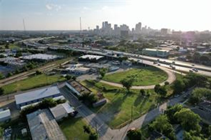 5 large city lots just off major interstate.  Within blocks of Fair Park.  Good build site for various commercial businesses.  Previous use was a printing company.  Lot leases during fair and other events at Fair Park that needs additional parking.  Value in Land.