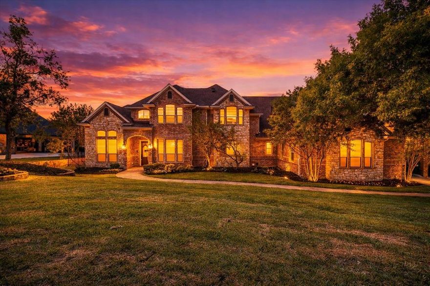 153 Crest Canyon Dr, Fort Worth, TX 76108, Covered Bridge Canyon II
Situated on over 2 private acres in the prestigious Covered Bridge Canyon II Sub Division, this impressive two-story residence, offering approximately 4,295 sq ft, combines luxury, privacy, and natural surroundings with breathtaking canyon views. From the moment you arrive, the property offers a sense of peace and exclusivity. Located in a quiet and highly desirable community, it provides privacy while maintaining convenient access to the city. Inside, soaring ceilings and an open-concept layout create a seamless flow between the gourmet kitchen and expansive living areas. The home includes a spacious office and a media and entertainment room, ideal for everyday living and gatherings. The master suite offers a true spa-inspired retreat, with custom closet that offer both functionality and practicality. Outside, a resort-style pool, private sauna, summer kitchen, detached gym or  entertainment suite, and natural landscaping create a unique outdoor setting. The balcony offers scenic views of the canyon greenery with beautiful sunsets, providing a peaceful setting throughout the day. A key highlight of the property is its outdoor experience. A stream runs through the property, and a private walking trail winds through the natural surroundings, complete with two charming bridges. Additional features include a three-car garage and an expansive covered area in front of the garages for added convenience. Located within the highly acclaimed Aledo Independent School District, this property offers a rare combination of privacy, natural beauty, and accessibility.