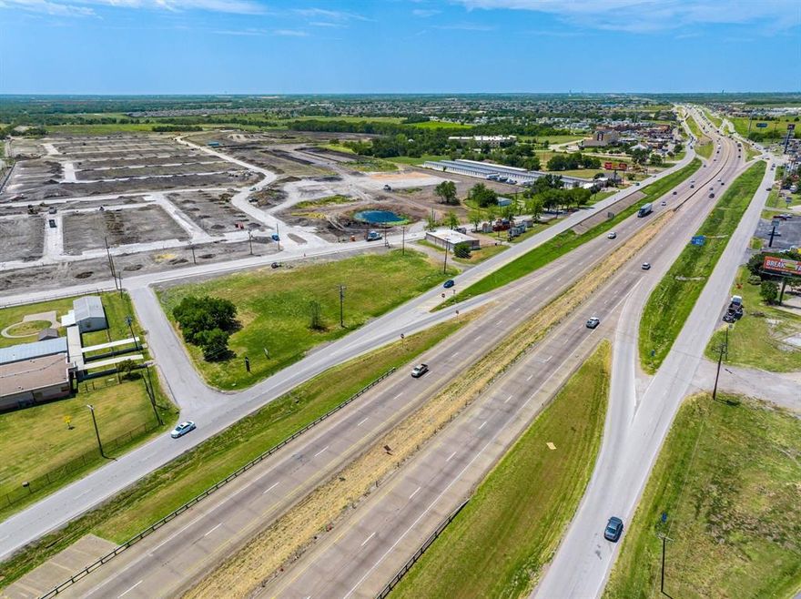 Prime 1.47-Acre Retail Development Opportunity on I-30. This 1.4709-acre tract offers exceptional visibility and accessibility with over 318 feet of frontage directly on Interstate 30, which sees more than 170,000 vehicles per day. Zoned for retail use, the site is fully equipped with City Water and City Sewer connections, making it development-ready. Strategically located in a high-growth corridor, the property is adjacent to Liberty Crossing, a new 520-home master-planned community currently under construction. The surrounding area is rapidly developing and features established national and regional retailers such as Buc-ee’s, Soulman’s Barbeque, and Family Dollar, among others. Build-to-Suit options are available. Whether you're looking to establish a flagship retail location, QSR, or service-based business, this site offers unmatched potential in one of the area's most dynamic retail environments.