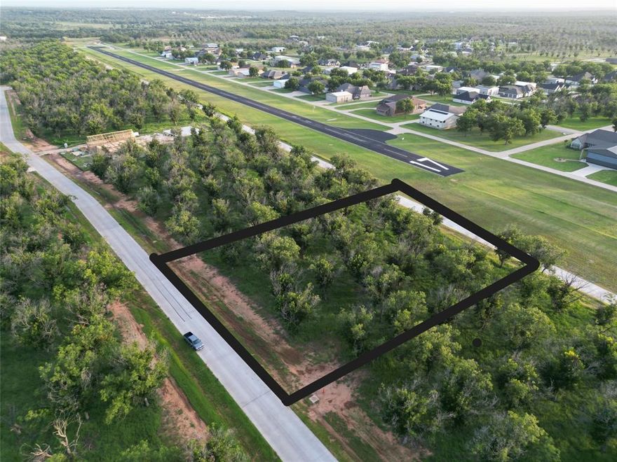 Lot 4011 Experience luxury living at The Landings Airpark near Granbury, Texas. This 1.036 acre lot offers direct taxiway access to the runway at The Landings Airpark located within the exclusive Pecan Plantation Country Club community. Enjoy resort-style amenities including 2 airports, 2 golf courses, a marina, clubhouse with 2 restaurants, tennis village, shopping district, RV Campground, and more. With three beaches along the Brazos River, gated entrances, and endless activities, this is a lifestyle you'll never want to leave.