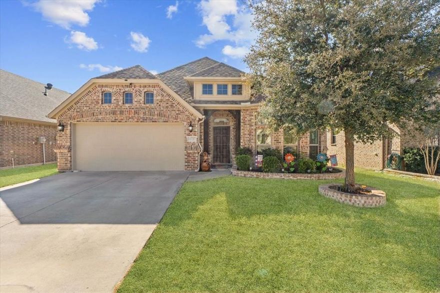 Looking for the perfect home? This 4-bedroom, 2-bathroom plus studio house is located just 15 miles from Downtown Fort Worth in the Live Oak Creek community. Situated in the White Settlement ISD School District, this home offers the ideal balance of work-life flexibility. The floor plan prioritizes privacy, with a primary suite separate from the secondary bedrooms. You'll love the open-concept living area, where natural light pours through expansive windows into the kitchen and dining spaces. Step outside to your private oasis: an extended covered patio featuring a built-in outdoor kitchen island with a gas range perfect for entertaining during this coming summer!  Additional highlights include 10-foot ceilings, ceramic tile flooring throughout, and major appliances included washer, dryer, and refrigerator. Even better, the home comes with solar panels at no additional cost to the buyer, helping reduce energy expenses.
A perfect blend of comfort, functionality, and energy efficiency ready to welcome its next owner.