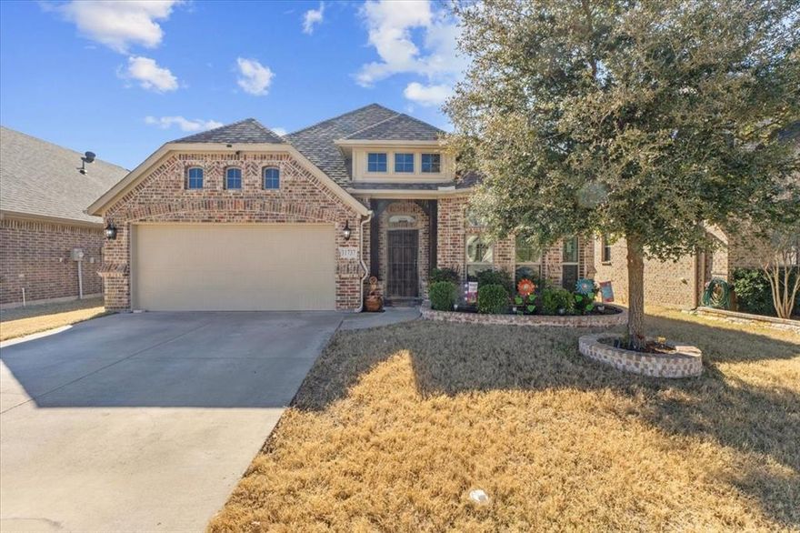 Looking for the perfect single-story layout with room for everyone? This 4-bedroom, 2-bathroom plus studio home is located just 15 miles from Downtown Fort Worth in the Live Oak Creek community. Situated in the White Settlement ISD School District, this home offers the ideal balance of work-life flexibility. The floor plan prioritizes privacy, with a primary suite separate from the secondary bedrooms. You'll love the open-concept living area, where natural light pours through expansive windows into the kitchen and dining spaces. Step outside to your private oasis: an extended covered patio featuring a built-in outdoor kitchen island with a gas range perfect for entertaining. Additional highlights include 10-foot ceilings, ceramic tile flooring throughout, and major appliances included washer, dryer, and refrigerator. Even better, the home comes with solar panels at no additional cost to the buyer, helping reduce energy expenses.
A perfect blend of comfort, functionality, and energy efficiency ready to welcome its next owner.