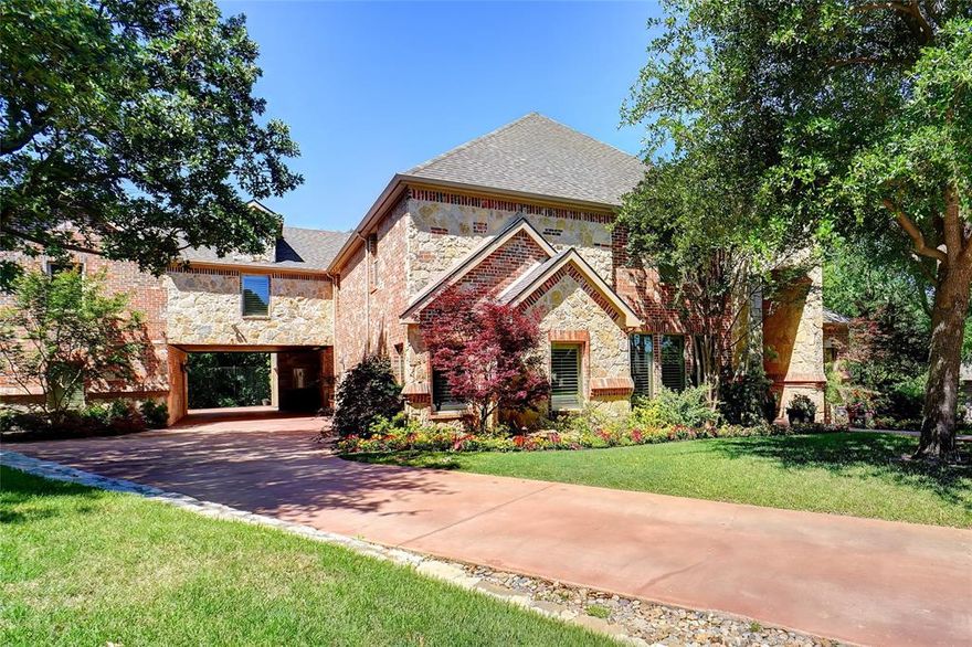 Offering $15K incentive to be used however the buyer chooses. Magnificent 5408 Sq Ft Private Gated Estate. Tucked away, this extraordinary estate offers an unparalleled blend of luxury, privacy, and natural beauty. Nestled against a backdrop of mature trees and protected green space, this one-of-a-kind property provides the ultimate retreat from the outside world while maintaining easy access to modern conveniences. From the moment you step inside, soaring vaulted ceilings and expansive windows create an open, airy ambiance filled with natural light. Picture perfect windows eloquently frame the backyard view. The grand living space is warm and inviting, anchored by an exquisite fireplace that adds charm and sophistication throughout. The gourmet chef’s kitchen is a culinary masterpiece, outfitted with high-end appliances, custom cabinetry, and sleek countertops designed for both function and elegance. Designed with entertainment in mind, this estate boasts a spectacular custom game and media room, the perfect space for hosting unforgettable movie nights, game tournaments, or intimate gatherings. A dedicated workout room offers the convenience of an at-home gym. Step into a private backyard oasis with pristine putting green that awaits golf enthusiasts. Multi level outdoor living spaces and two stunning fireplaces truly add to the luxury of this incredible backyard retreat. The heavily wooded surroundings enhance the sense of seclusion, creating a peaceful sanctuary that feels worlds away from the everyday hustle. This exceptional home is located in the award-winning Keller ISD, making it an excellent choice for families seeking top-tier education. Situated minutes from Southlake Town Square, enjoy upscale shopping, fine dining. This estate is a rare opportunity to own a truly remarkable home that harmonizes elegance, functionality, and natural beauty. Whether you’re seeking a private retreat or an entertainer’s dream, this property is a testament to refined living.