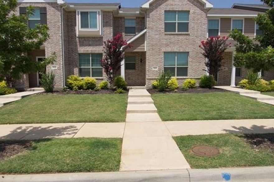 Welcome home to Brentwood Place Townhomes, where every detail is designed with your comfort and convenience in mind. Great location! Just a short walk from UNT Discovery Park, the newly opened New Denton High School and the new Reeves Elementary school just across the street, set to open its doors in Fall 2025. Enjoy the elegance of wood look luxury vinyl plank flooring throughout the first floor and bathrooms, complemented by laminate tile on the stairs and second floor. Indulge in the luxury of a master bath with dual sinks and a 60-in oversized walk-in shower, complete with a spacious walk-in closet. Every bedroom and the living room are equipped with ceiling fans for added comfort. Convenience meets style with 2-in faux wood white blinds on all windows and built-in cabinets above the washer and dryer space. Your kitchen boasts Whirlpool stainless steel appliances including a microwave, stove, and dishwasher. Outside, full gutters and downspouts ensure your home is well-maintained.