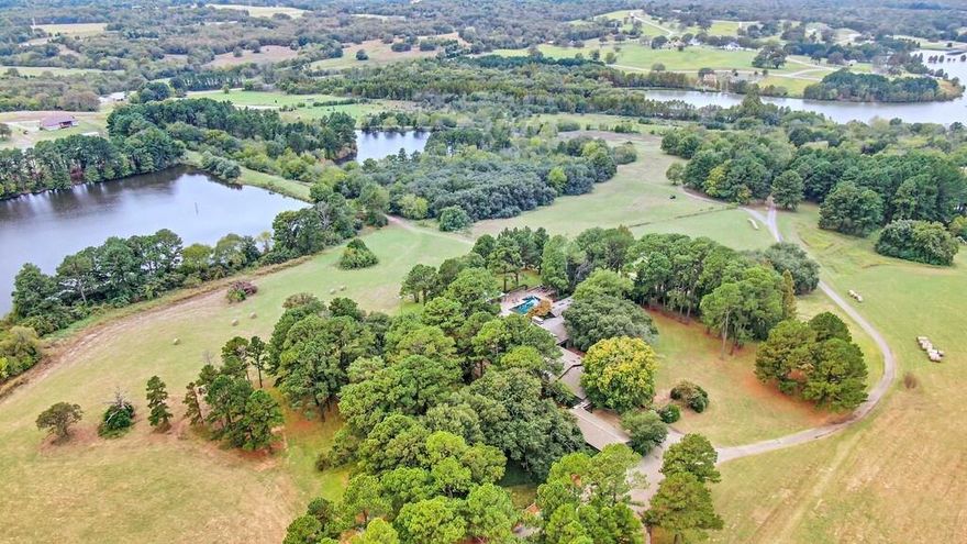 Caplin Ranch - A place to make memories.....the residence of your dreams...OR your destination Winery, your Fisherman's paradise, your Golfers Getaway, your Nature Lovers Oasis, your Equestrian Exclusive Experience, your Families Holiday Home, your Birding Adventure, your place of Restoration and Peace, your Bed & Breakfast, your dreams come true in Athens TX on your 191 acre ranch. Currently operating as an Air B&B destination. Your options and opportunities are bound only by your imagination. Indulge yourself on a grand scale in rolling hills and elegant simplicity. Want for nothing and renew your spirit in the freedom and peace offered by nature unique. Let go and live your dreams on this beautiful property with an extraordinary history. The original fishery for the Florida Hybrid Black Bass; the original strain still lives in the West Lake. Fish for trophy bass, catfish, crappie, perch and you may spot a bald eagle from your deck. Serenity and Peace are the main attraction with 4 private lakes making up over 300 acres of vibrant waters. Rolling hills, magnificent trees, open spaces and unforgettable sun rises and sun sets. Let's not forget the over 10,000 sq ft living quarters, 8 bedrooms, 8.5 bathrooms, the Chefs Kitchen, perfectly placed porches, 4 carports, one garage, salt water swimming pool, gas fire pit, regal fire place, game room, wet bar, conference room, wine cellar, indoor horse riding facility, tack room, 8 horse stalls and paddocks, tree lined entrance, 3 water wells, 3 docks, pavilion with bathrooms and out door kitchen, 50 acre high game fenced area, city water at the managers house, gated entry and guard house. Come see the gorgeous views. Come live your dreams.Visit our website:www.CaplinRanch.com