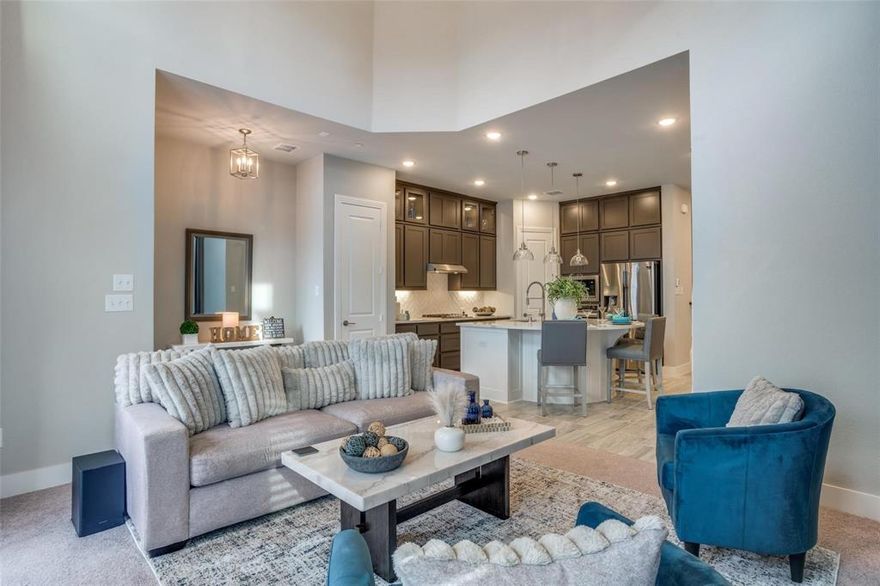 FULLY FURNISHED!! Plus All Appliances Included!  SHOWS LIKE A MODEL!  Calling all Executives!  Must See BEST OF CLASS Highland Homes construction! This exquisite townhome stands out with its beauty and functionality while featuring a light-filled, upscale design with a low-maintenance, lock-and-leave lifestyle. With three spacious bedrooms located upstairs, it’s perfect for both relaxation and entertaining. The heart of the home is the expansive kitchen, showcasing a huge granite island and a convenient corner pantry. The open layout seamlessly connects the kitchen to the inviting living area, ideal for family gatherings and hosting friends. Step outside to your front patio, which is perfect for outside dining and enjoying the beautiful Texas weather. 

Trinity Falls is a 1700 acre, master-planned community focused on connectivity, recreation, and relaxation, allowing you the freedom to lock up and leave with peace of mind.  The neighborhood has pools, splash pads, sports courts, a pavilion, miles of waking trails, and on-site elementary. The Lodge is an event space with a catering kitchen, co-working areas, fitness room, event lawn, and dog park.  The vibrant community boasts scenic lakes, miles of hike and bike trails, and multiple parks, providing endless outdoor activities and green space to explore. Take a dip in the community pool or enjoy leisurely walks through the well-maintained surroundings.   HOA dues are $375 per month and billed thru 2 entities- $250 per month for the Townhouses and $125 per month for Trinity Falls Development.