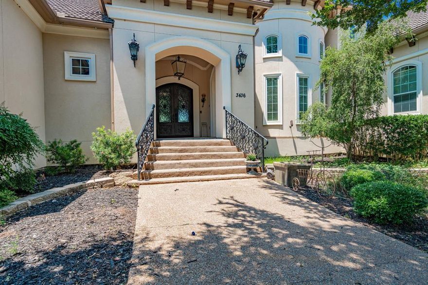 Extraordinary opportunity awaits to own this breathtaking 18-acre private gated estate in Arlington. This exquisite Mediterranean-style home boasts 3 levels, 5 bedrooms, 7 baths, 3 living rooms, 2 dining rooms, 4 fireplaces. The luxurious primary suite with a sitting area, fireplace, veranda access, 2 expansive closets, and a lavish bathroom. The office showcases a fireplace, and custom filing systems. The spacious kitchen offers an island, breakfast bar, built-in refrigerator, double gas oven, cooktop, and a generous walk-in pantry. Step out onto the veranda and take in the serene views overlooking the greenbelt and Rush Creek, complete with a cozy fireplace. The property includes a game room with a separate kitchen, a resort-style indoor heated pool with a hot tub, waterfall, slide, and full cinematic theater. The third floor adds to the allure with 4 bonus rooms. Added charm to this remarkable property are the barn, arena, 5 fenced paddocks, guest house, 2 pavilions, and tack house.