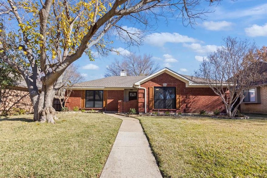Multiple Offers! Best and Final by 12.21 at 5pm. Charming one-story home in sought-after Coppell neighborhood near Andy Brown Park! Ideal floor plan with open living area, handscraped wood floors, granite countertops in kitchen and bathrooms, and stainless steel appliances in the kitchen. Highlights include a 2018 patio expansion with flagstone and pergola, new AC & Ductwork in 2018, and a 2019 kitchen upgrade with under cabinet lights. The laundry room now has stylish wood cabinets. The front and back yards got a makeover in 2020, and the driveway was extended. The fence, replaced in 2017 and refinished in 2023.  New windows throughout in 2023.
