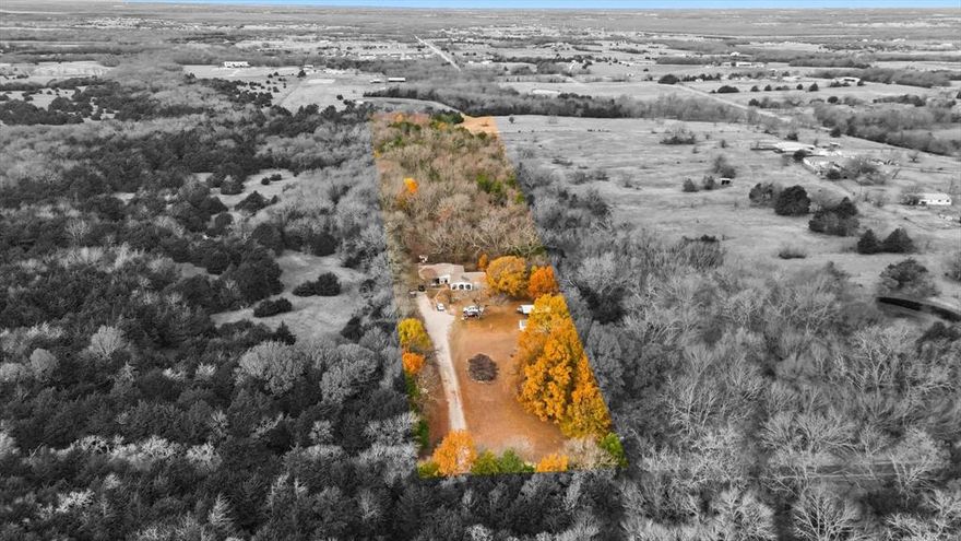 Exceptional acreage opportunity! Discover the potential of this beautiful 7-acre property located in eastern Collin County with no HOA. The heavily wooded lot features a cleared homesite, expansive driveway, plenty of room for a workshop, and existing utilities. This is true country living with easy access to the retail and business centers in McKinney, Plano, and Allen. This expansive lot is being sold for land value only. The homesite offers a prime opportunity to build your dream home, and it is being offered well below market value. The house on the property is uninhabitable, holds no monetary value, and should not be entered due to safety concerns. Showings will be limited to visual inspection of the property, with no access to the existing structure.