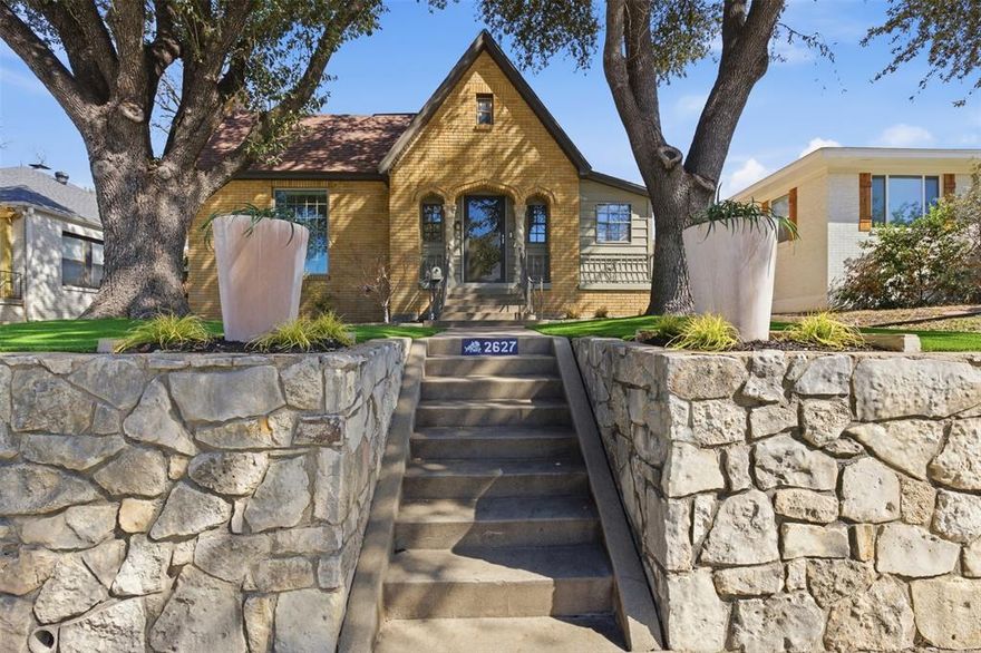 Nestled in the heart of the TCU area, this charming Tudor-style home blends timeless character with thoughtful modern updates. Featuring 3 bedrooms plus a versatile loft space—with a closet and sink that can easily serve as a 4th bedroom, office, or private retreat—the home offers flexible living options to suit your needs. The updated kitchen is equipped with sleek stainless-steel appliances, honed marble counters, abundance of cabinetry, and opens to the main living and dining areas, creating an inviting layout perfect for entertaining or everyday living. The cozy living room features a classic wood-burning fireplace, adding warmth and character to the open concept space. Recent improvements include energy-efficient new windows, a durable Class IV roof, tankless water heater, and a gated driveway that provides both privacy and additional parking. The low-maintenance front yard features artificial turf and a sprinkler system, offering year-round curb appeal with minimal upkeep. Additional highlights include two full bathrooms, a charming bonus sleeping porch, and a backyard with patio space ideal for relaxing or hosting guests. Property located within the TCU overlay and has registered property for FOUR tenants and is grandfathered. Located just minutes from TCU, this home provides convenient access to local dining, shopping, and entertainment while being tucked into one of the area’s most picturesque neighborhoods. Don’t miss the opportunity to own this beautifully updated Tudor gem.