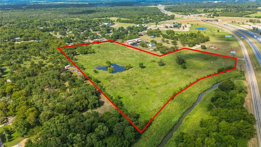 Incredible opportunity to own 13.079 ± commercial and residential acres located on the east side of Greenville, TX! This prime property sits next to the popular Audie Murphy Cotton Museum and offers excellent visibility and accessibility. This property has a mix use of commercial along Interstate 30 with some residential part of it at the back that faces Division St. The land features rolling terrain that provides natural character and flexibility for a wide variety of development plans—whether you're envisioning a shopping center, office park, mixed-use concept, or destination retail space along with possibly some residential use, then this property is for you. The property is fenced and ready for your vision. With the rapid growth and development in Greenville, this location is ideal for businesses looking to take advantage of the expanding local economy and increased traffic in the area. Easy access to I-30 and major thoroughfares enhances its value and reach. Bring your ideas and build something incredible on this well-positioned tract. Greenville is on the move—be a part of its future! Perfect multi use property! DO NOT ATTEMPT TO ENTER THE PROPERTY WITHOUT THE LISTING AGENT! CURRENTLY CATTLE ON THE PROPERTY! NO LOCKBOX!