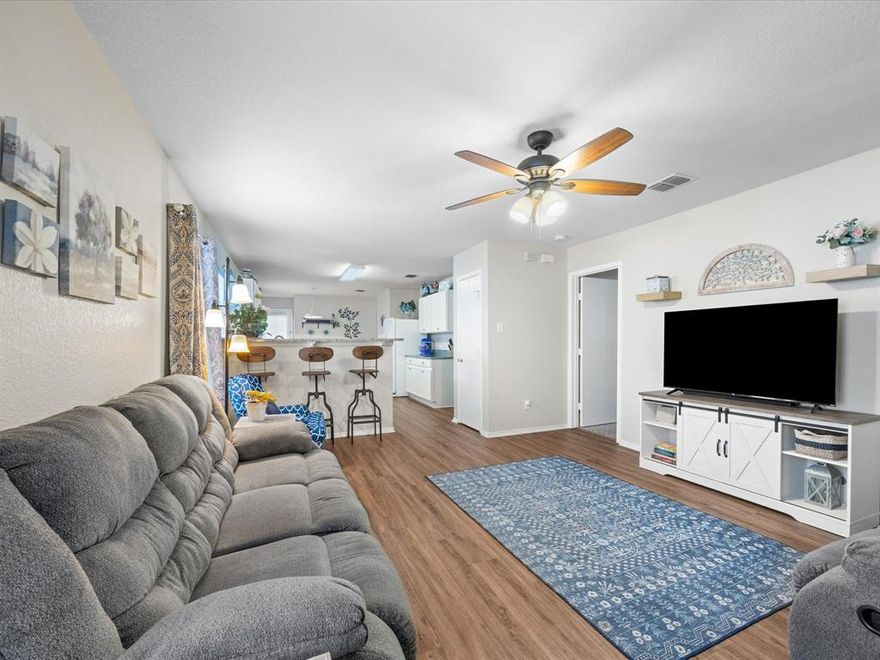 This spacious residence features a desirable open-concept floor plan that connects the kitchen, living, and dining areas, creating an ideal layout for both everyday living and entertaining. The kitchen is a standout, with updated countertops, stainless steel appliance, white cabinets with hardware, farmhouse sink, ample cabinet storage, separate pantry and a eat in kitchen for casual dining. The split-bedroom design ensures added privacy, making it perfect for guests or a home office setup. Luxury Vinyl Plank Flooring throughout the home and New carpet in bedrooms. The primary bedroom is abundant with space & the walk in closet is glorious! The sellers have taken great care of this home, the water heater installed in 2025, Roof replaced in 2022. 
Located just moments from the neighborhood park and playground, this home offers easy access to outdoor fun and community engagement. You’re also close to Marine Creek Lake, where residents enjoy trails, kayaking, fishing, and scenic views. Shopping, dining, and entertainment options are just minutes away at Lake Worth Marketplace, Alliance Town Center, and Downtown Fort Worth. With convenient access to major highways like Loop 820 and I-35W, commuting and weekend getaways are a breeze.