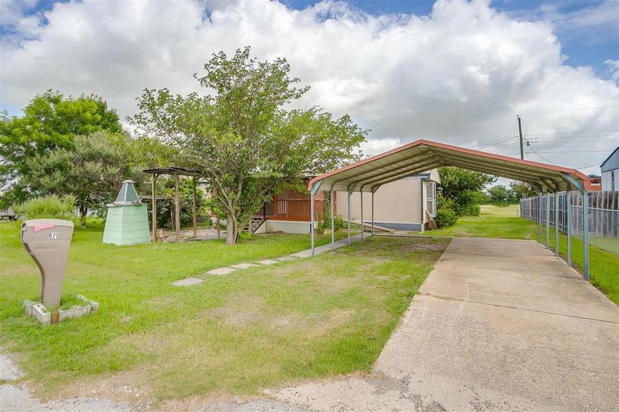 Handy location close to Hwy 67 and I-35!  This one has had some updates including paint and flooring.  Features all solid surface flooring throughout inside.  Ouside are a big covered front patio, ramp for wheelchair access plus a two-car carport.  Several good sized storage buildings on the property. No FHA or Conventional financing available.