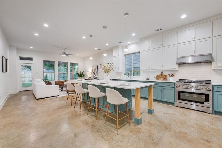 This newly built 3-bedroom, 2-bathroom home in Greenville features an open floor plan with 10-foot ceilings in the kitchen and living room. The design combines traditional and modern elements for a clean, functional layout. The kitchen includes a 36-inch gas stove and plenty of counter space. A spacious backyard offers room to relax or entertain