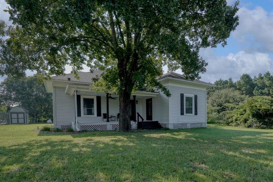 Discover a rare blend of history and modern living in this beautifully restored 1920s farmhouse nestled in the heart of Mt. Selman. Sitting proudly on a spacious half-acre lot, this 3-bedroom, 2-bathroom home spans 2,196 sq. ft. and has been meticulously updated while preserving its original charm. From the moment you arrive, the inviting oversized front porch sets the tone—perfect for sipping morning coffee, welcoming friends, or simply enjoying East Texas sunsets.

Inside, craftsmanship and character meet contemporary style. You’ll find gorgeous shiplap walls, select hardwood floors, and two cozy fireplaces that infuse the home with warmth and personality. The formal dining room offers the ideal backdrop for gatherings, while the updated kitchen features premium appliances, sleek fixtures, and ample counter space—making meal prep and entertaining a breeze.

Every upgrade has been thoughtfully chosen to provide peace of mind for years to come. Major renovations include all new electrical wiring, all new plumbing, new HVAC system, new roof, new flooring, tankless water heater, and updated light fixtures throughout. Plus, a new septic system installed 9-9-25 ensures worry-free living.

Outdoors, the generously sized backyard offers room to garden, host barbecues, or simply relax in your own private retreat. Located in Jacksonville ISD with a Bullard mailing address—but without Bullard city taxes—this home offers the best of both worlds: small-town charm with quick access to nearby amenities.

Don’t miss your chance to own a stunning piece of East Texas history that’s fully move-in ready and brimming with character. Schedule your private showing today and experience the perfect blend of timeless style and modern convenience!