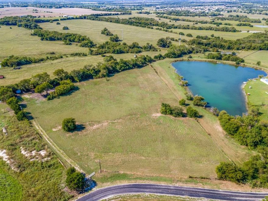 This 6 Acre tract in Nevada, Texas is the perfect canvas for your dream home or mobile home.  The property is fully fenced with barbed wire and features a prepared pad site, ready for construction.  Enjoy scenic views overlooking 3.5 Acres of a neighboring lake, offering a peaceful setting with plenty of space to spread out.
Conveniently located within half a mile of the Community ISD schools and with easy access to nearby larger towns, this property combines rural tranquility with everyday convenience. Whether you're looking to build now or invest in the future, this land offers a rare opportunity in a growing area.